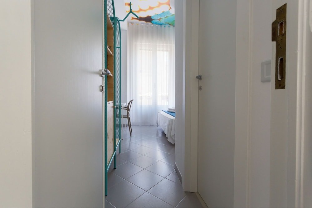 Фото Hotel L'Uomo e il Mare