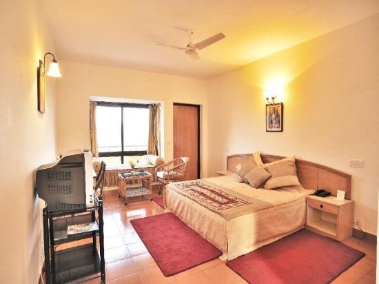 Фото Woodsvilla Resort