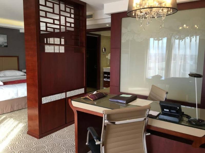 Фото Huatian Chinagora Hotel