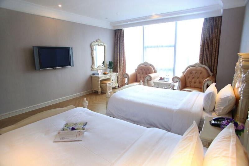 Фото Kingstyle Guansheng Hotel