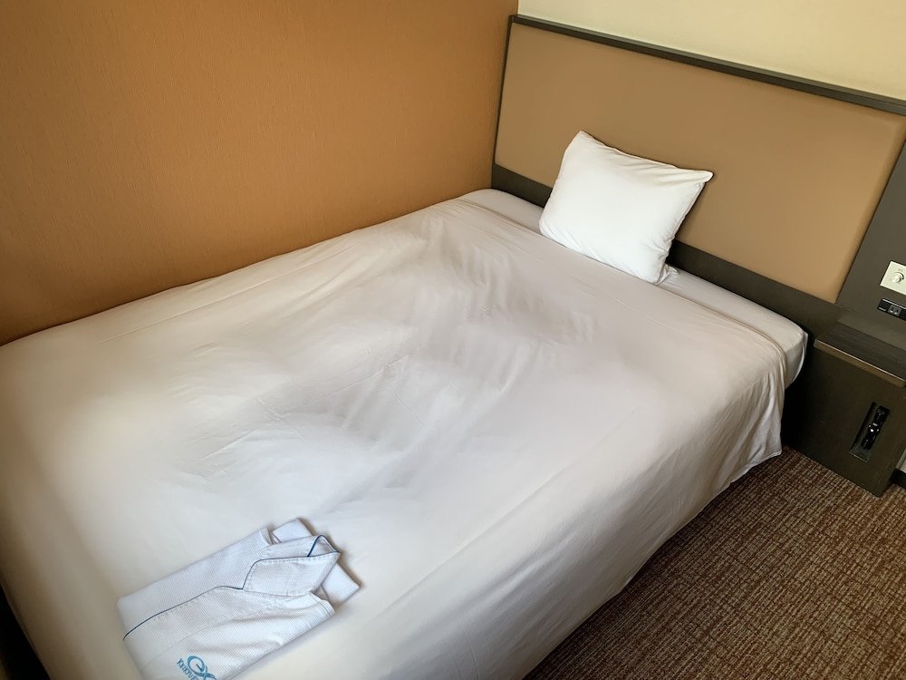 Фото Issyuku Hotel Asakusabashi