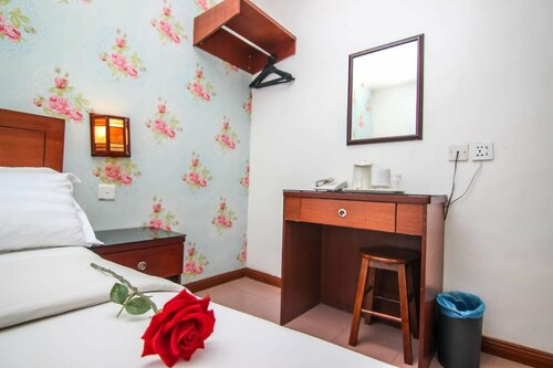 Гостиница Rose Cottage Hotel Taman Daya