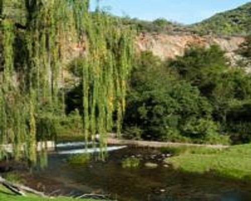 Фото Old Mill Lodge, Working Ostrich Farm & Restaurant, Oudtshoorn