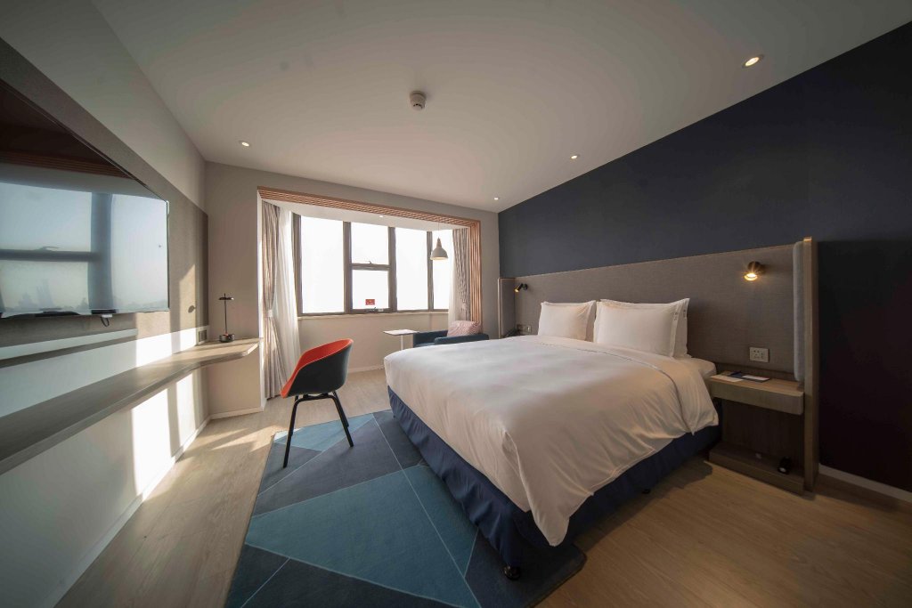 Фото Holiday Inn Express Shanghai Jinqiao Central, an Ihg Hotel