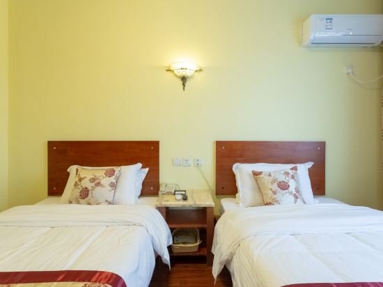 Фото GreenTree Alliance Shandong Qingdao Huangdao ZhanGYAnshan Road ZhonGYAng Hotel