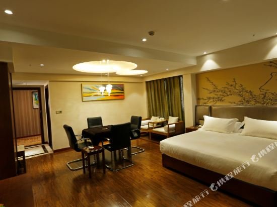 Фото Caifu Holiday Hotel