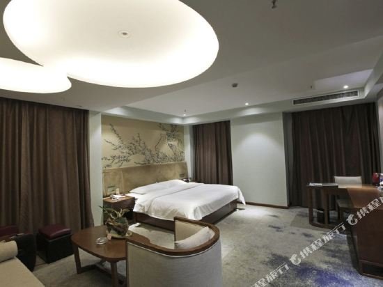 Фото Caifu Holiday Hotel