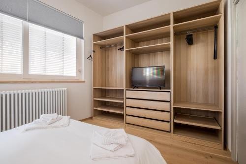 Фото Sant'orsola Suites Apartments