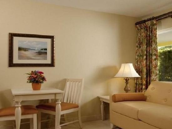 Фото Alden Suites - A Beachfront Resort