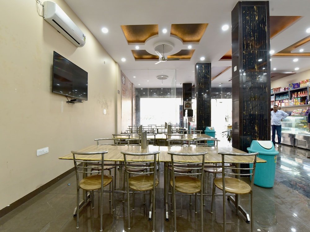 Фото Oyo 23085 Baba Hotel