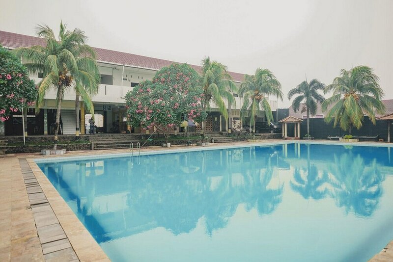 Гостиница RedDoorz Syariah @ Pasir Putih Jambi в Джамби