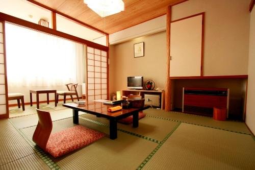 Фото Hiraizumi Hotel Musashibou