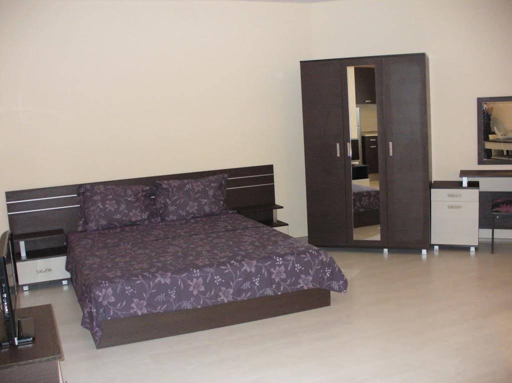 Фото Rose Garden Omax Hotel Apartments