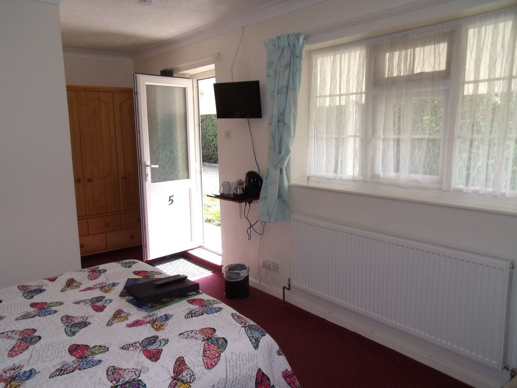 Фото The New Inn Motel