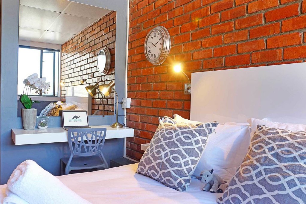 Фото Happy Rhino Hotel