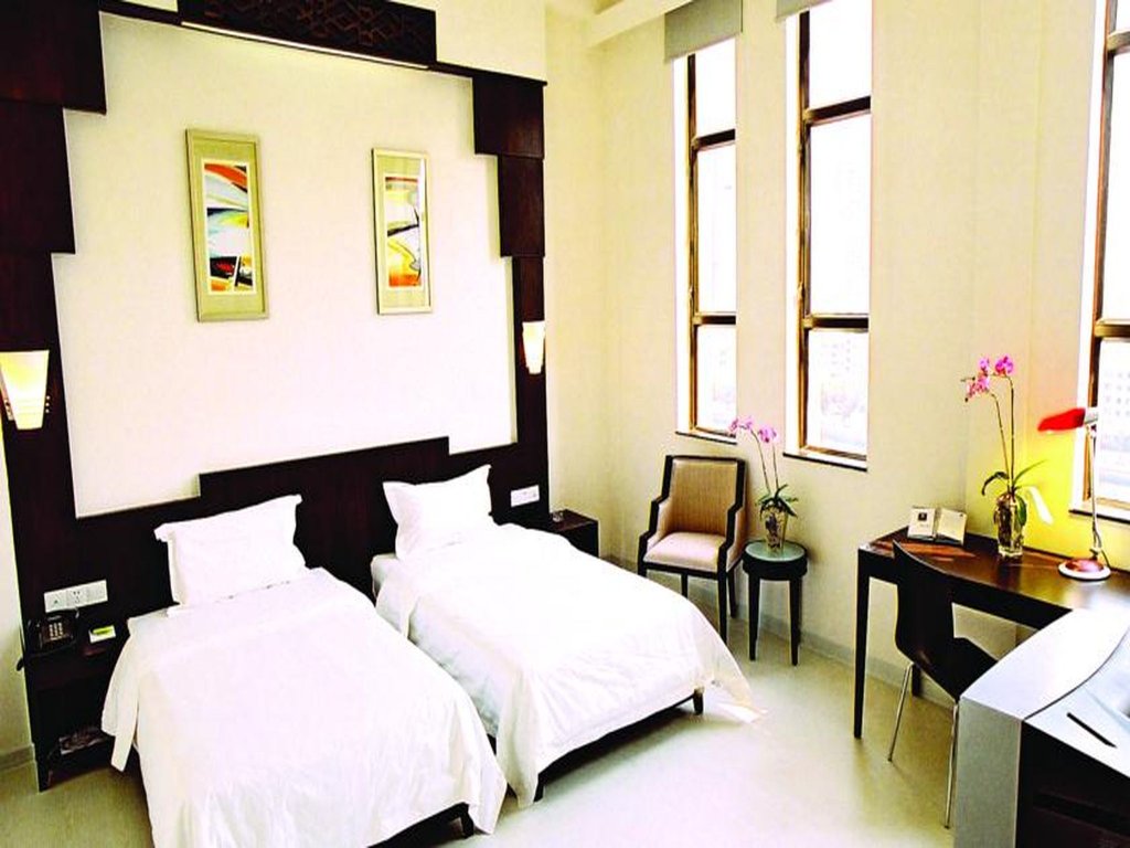 Фото Guangzhou Aiqun Hotel