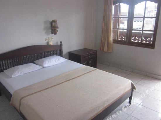 Фото Taman Mekar Beach Inn 2