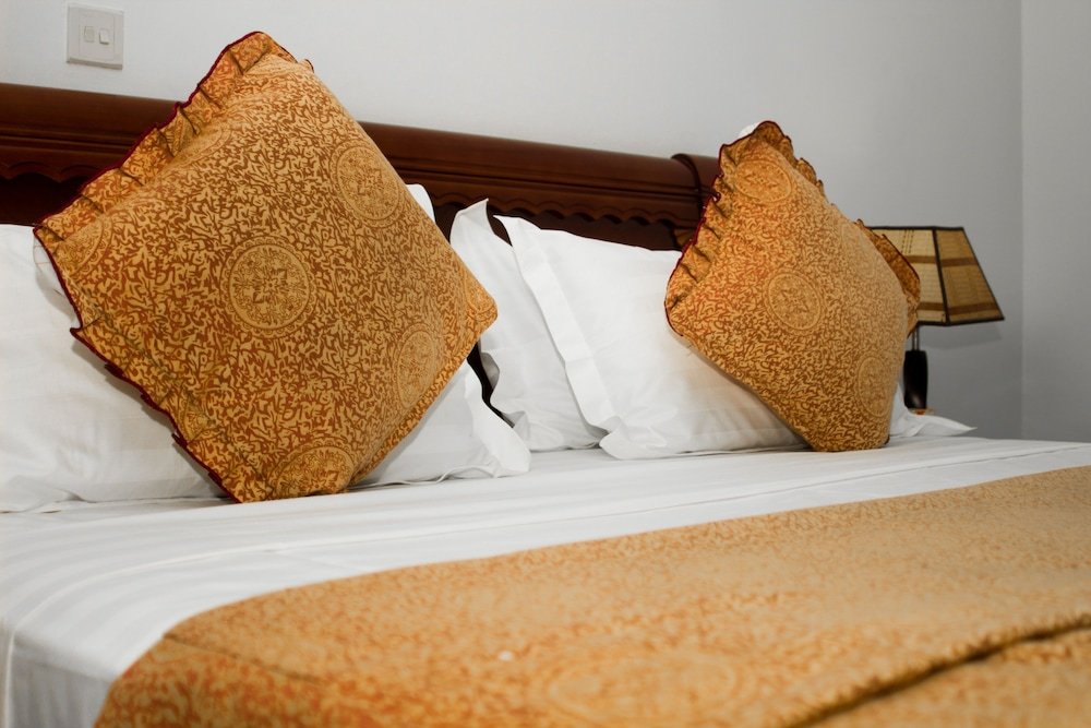 Фото MJ Grand Hotel