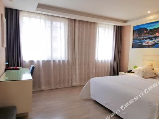 Фото Yiwu Baide Theme Hotel