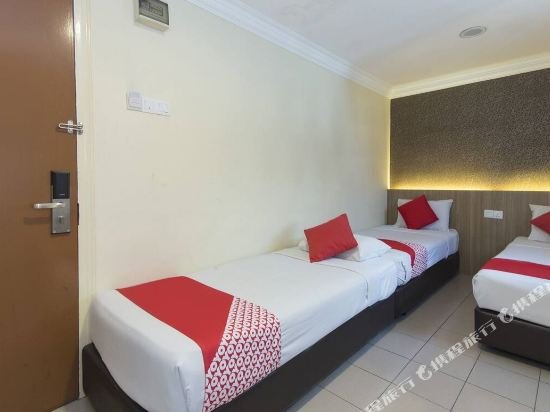 Фото Oyo 615 Dragon Inn Premium Hotel