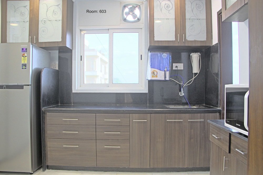 Фото Click White House Residency Vadodara