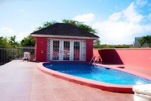 Гостиница Cocoplum Rest N Hideaway 1
