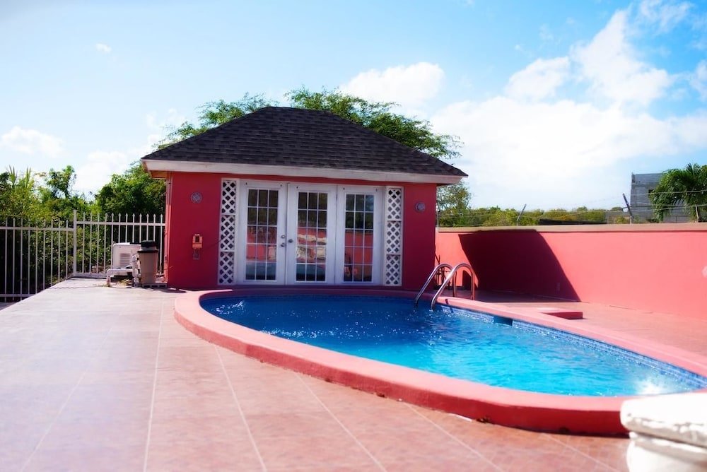 Фото Cocoplum Rest N Hideaway 1