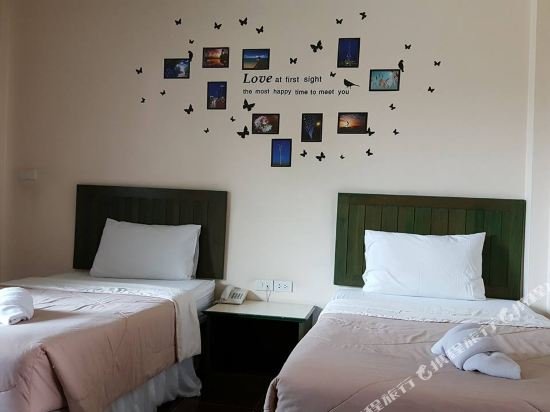 Фото Baan Suksiri Hotel