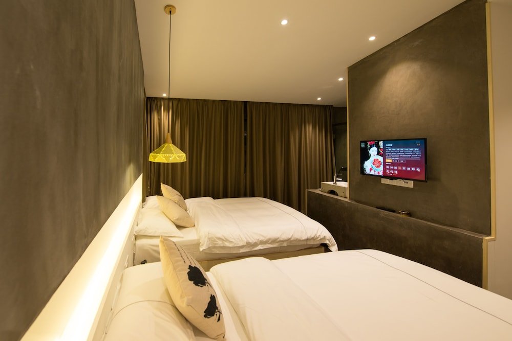 Фото Xiamen Feisu Tianchunshe Holiday Villa