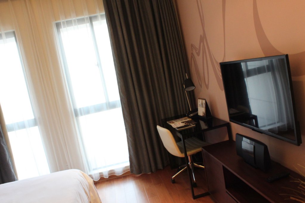 Фото Modena by Fraser New District Wuxi