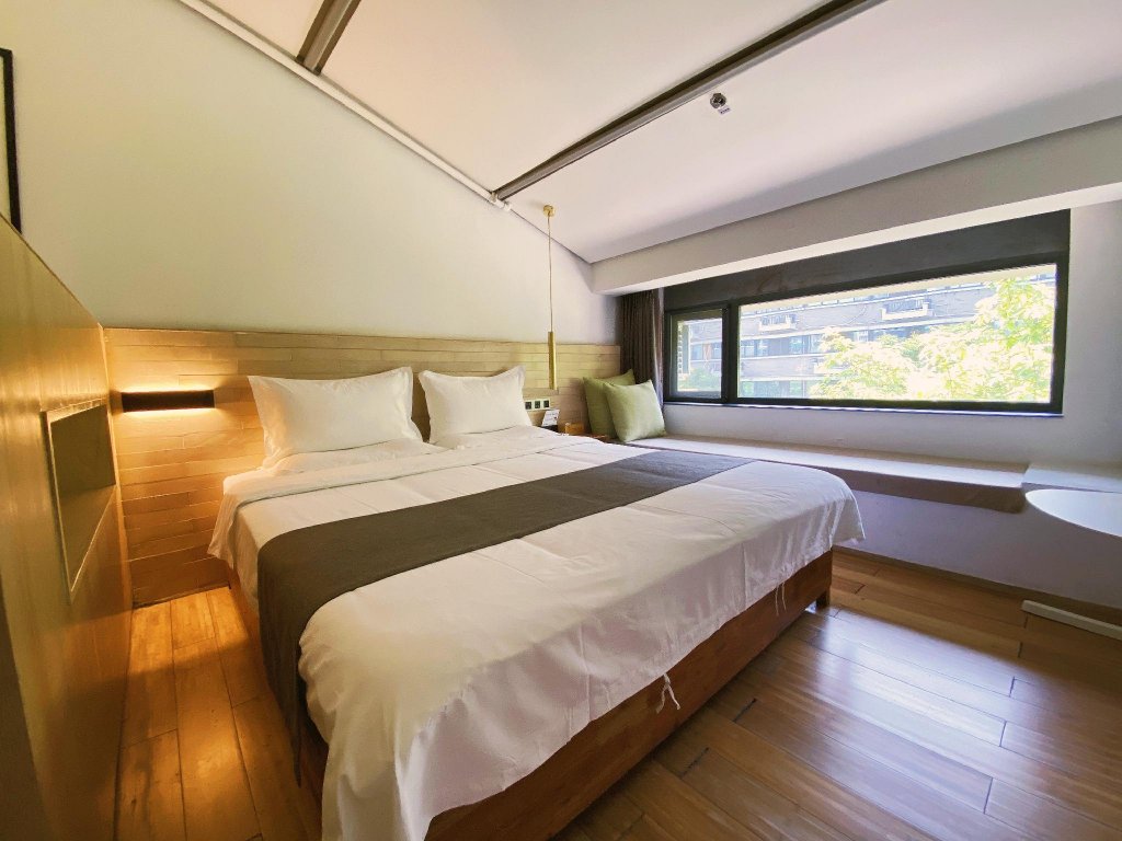 Фото Travelling With Hotel Chengdu Wide and Narrow Alley