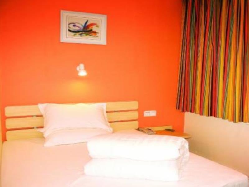 Фото 7 Days Inn Fangchenggang Taohuawan Plaza Branch