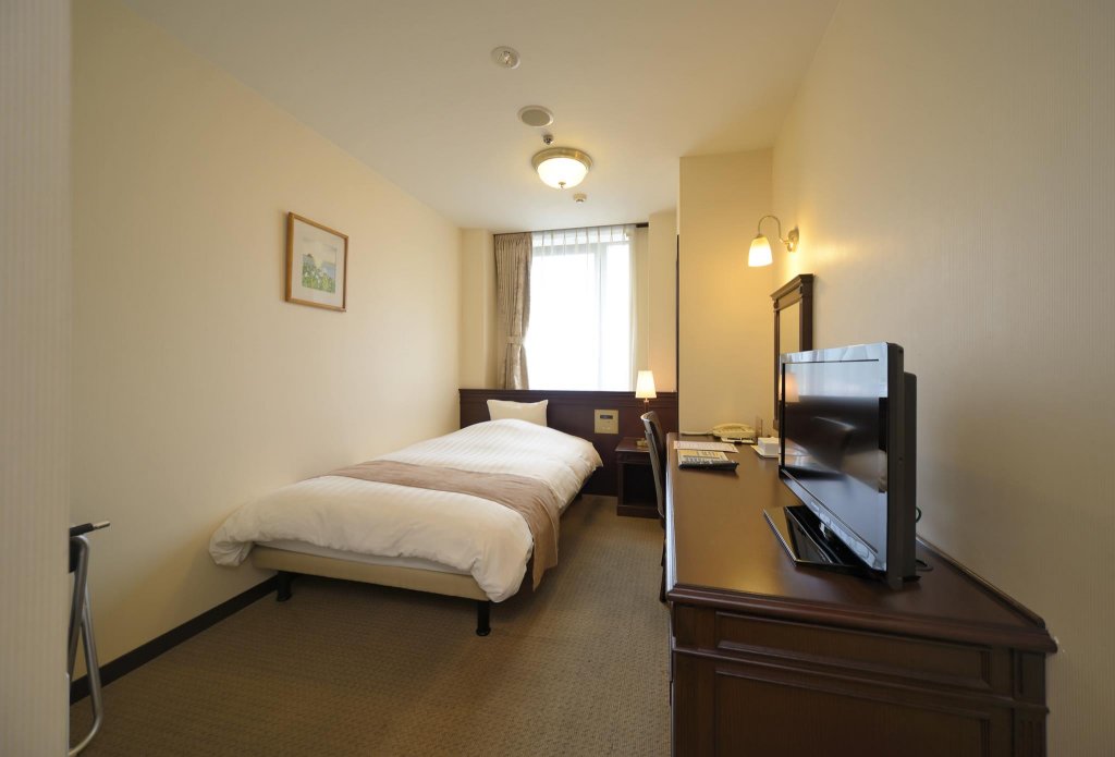 Фото Amami Sunplaza Hotel