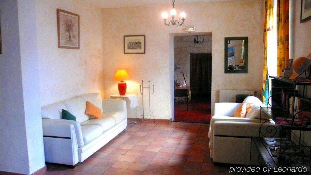 Фото Au Saint Roch - Hôtel et Jardin