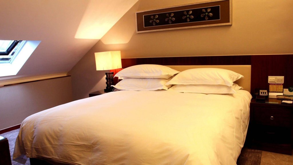 Фото Yiwu Wendemu International Hotel