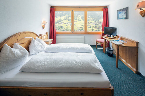 Гостиница Jungfrau Lodge, Swiss Mountain Hotel в Гриндельвальде