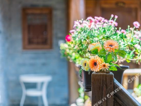 Фото Li Jiang Hemuju Inn