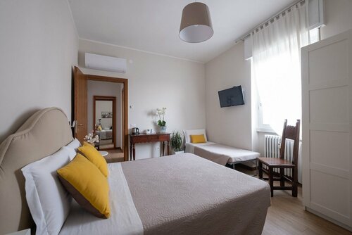 Гостиница Cute & Cozy Rooms в Бергамо
