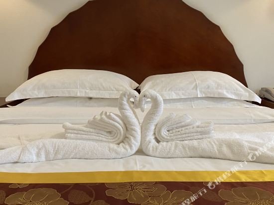 Фото Hainan Yehai Hotel