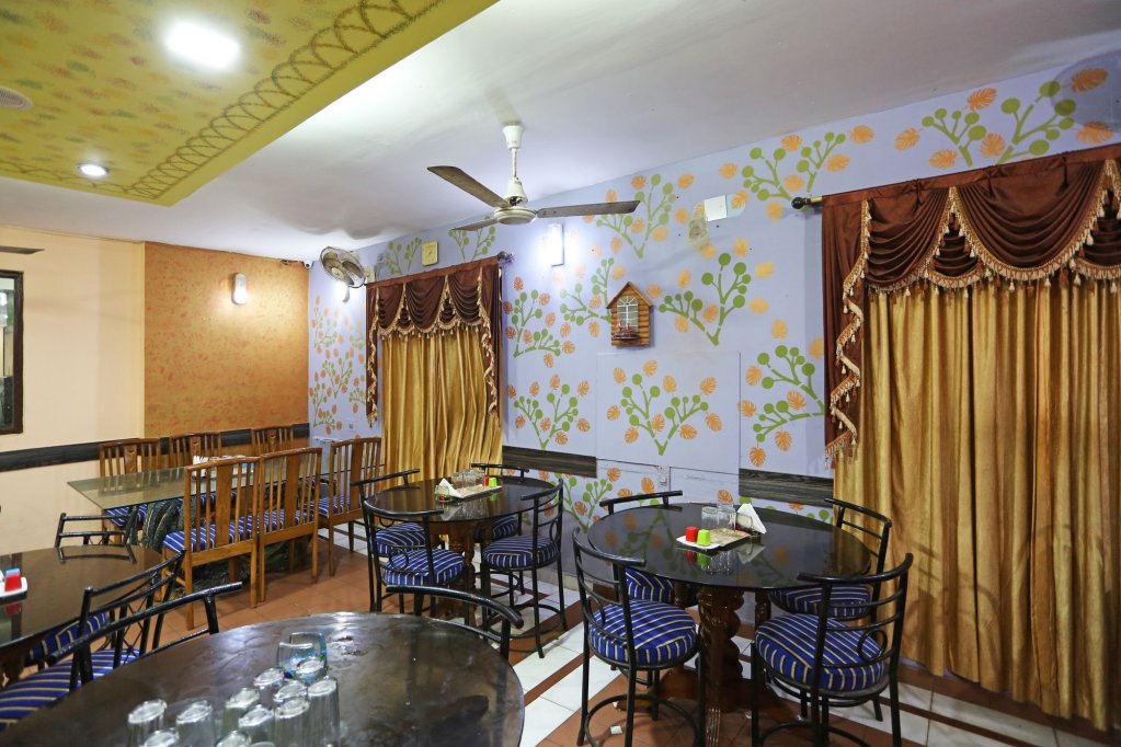 Фото Capital O 6077 Hotel Ashraya