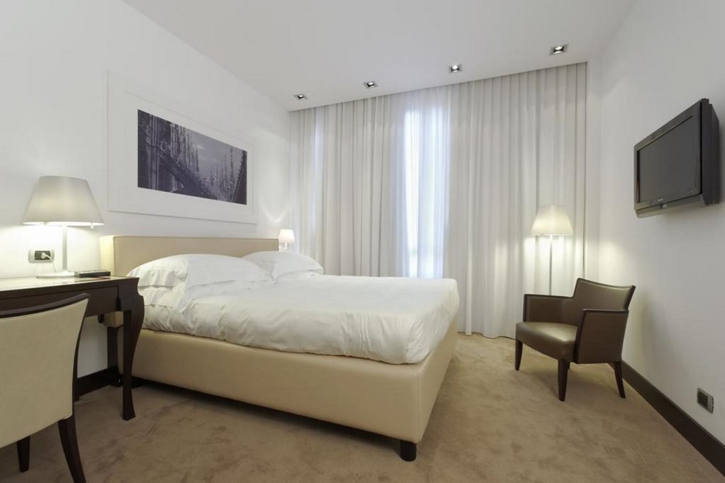 Фото UNAHOTELS Cusani Milano