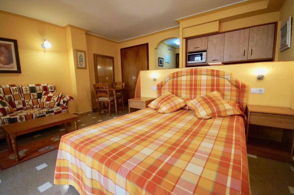 Фото Unique Hotel Apartments