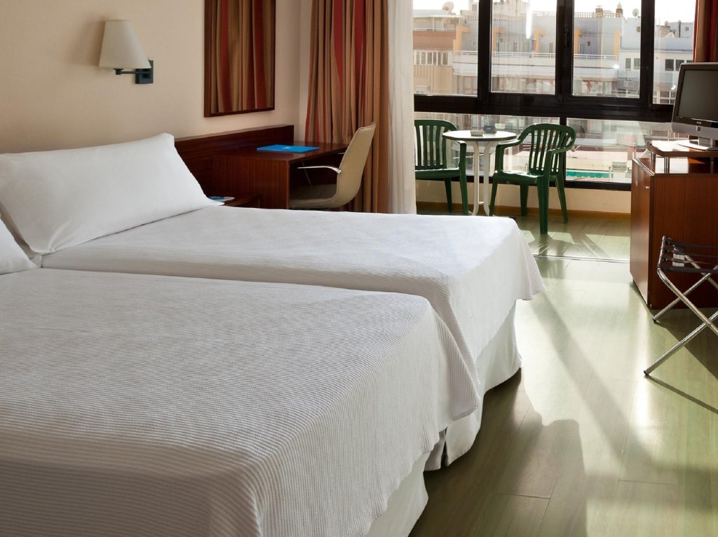 Фото Отель Nh Las Palmas Playa las Canteras