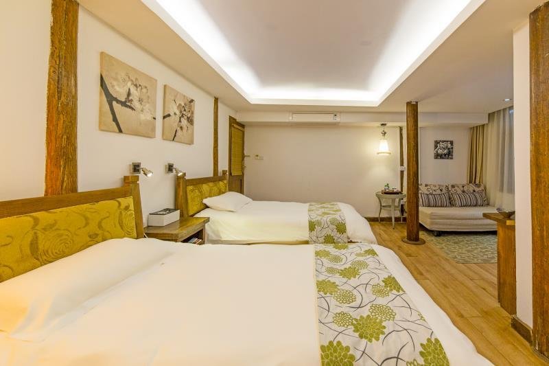 Фото Merry Inn Lijiang