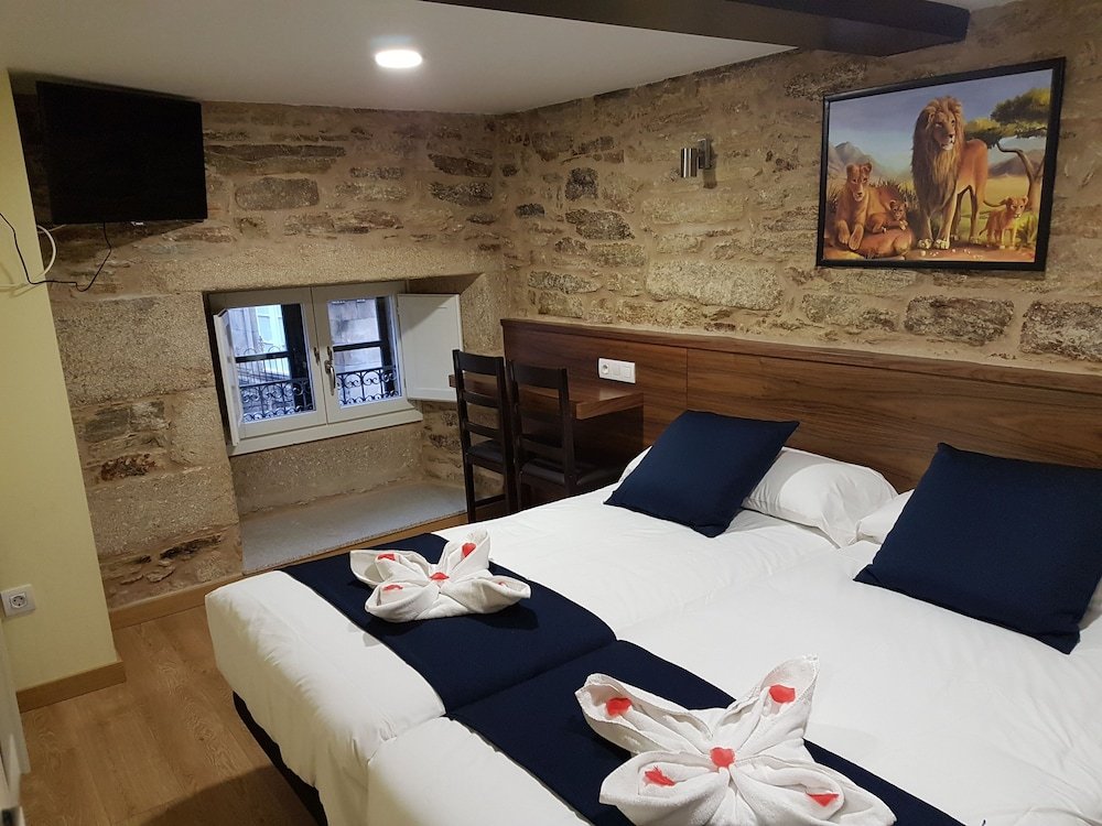 Фото Oxford Suites Santiago de Compostela