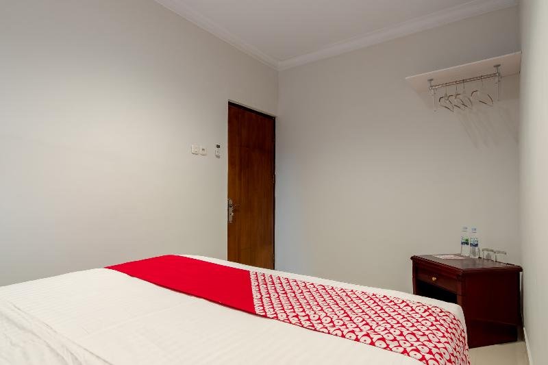 Фото Oyo 283 Helvetia Residence