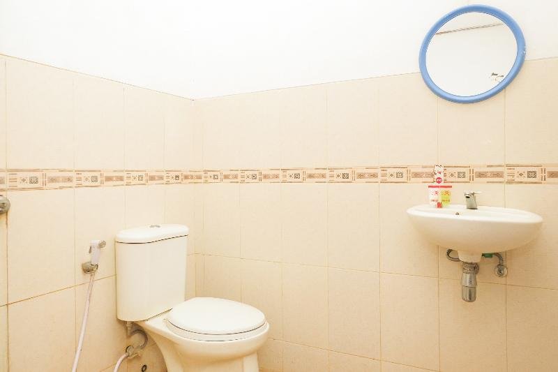 Фото Oyo 353 Loesje Guest House Syariah