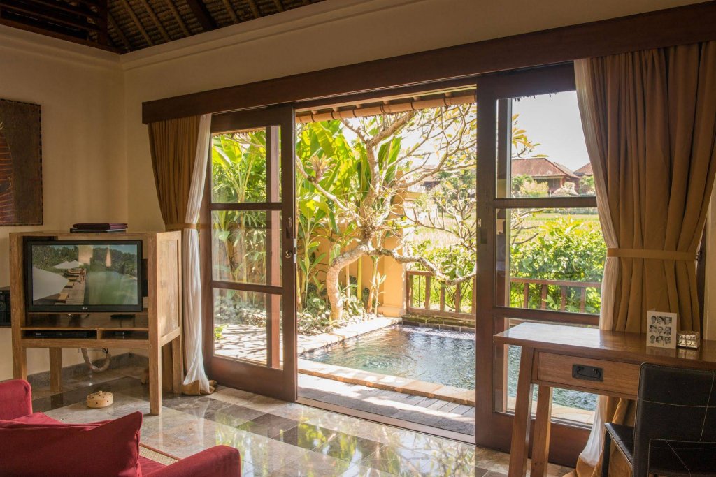 Фото Komaneka at Bisma