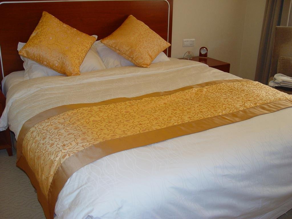 Фото Dalian Kerren Hotel