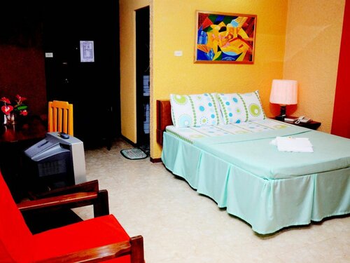 Гостиница Oyo 599 Palawan Village Hotel в Пуэрто-Принсесе